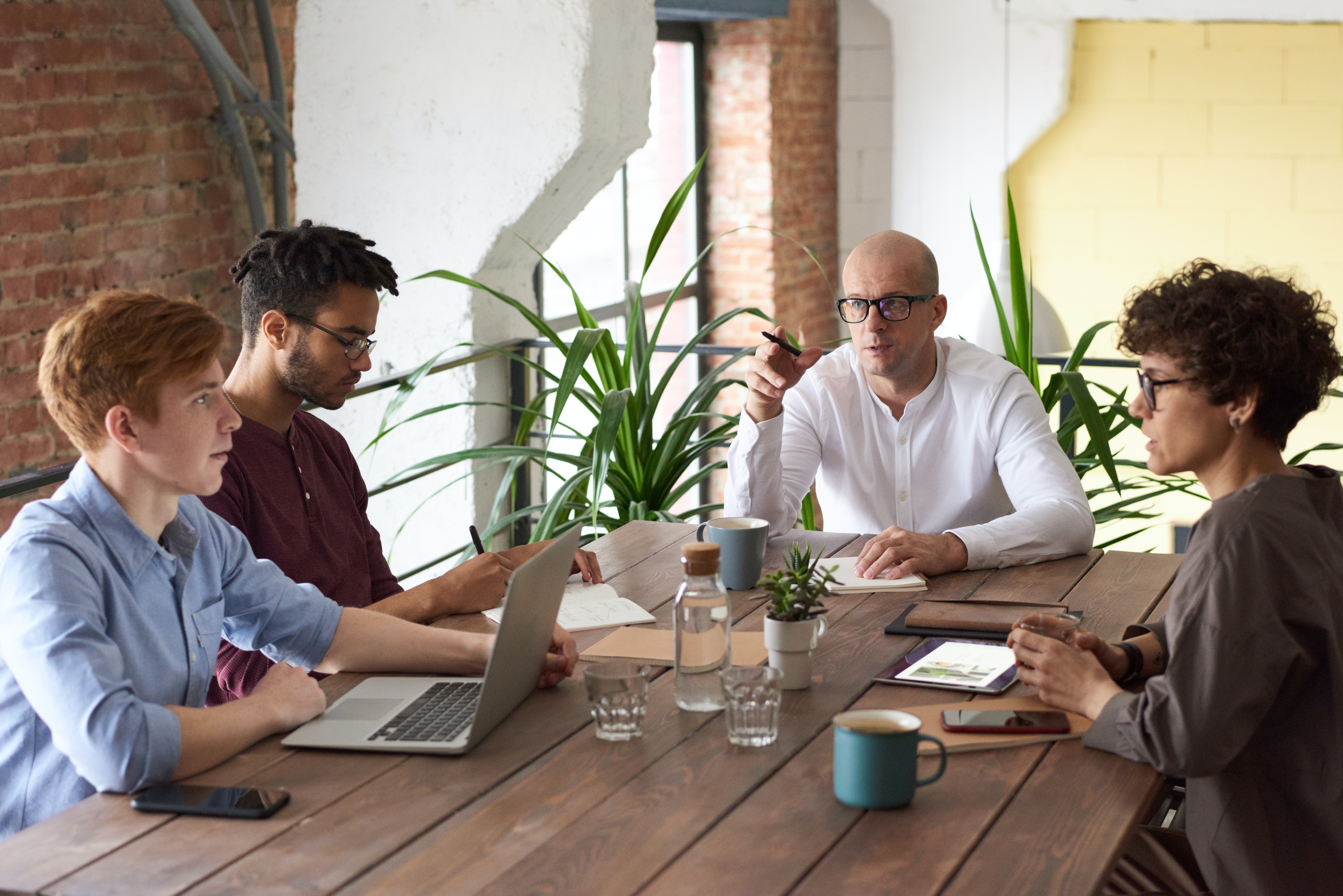 agency team reviewing reports
