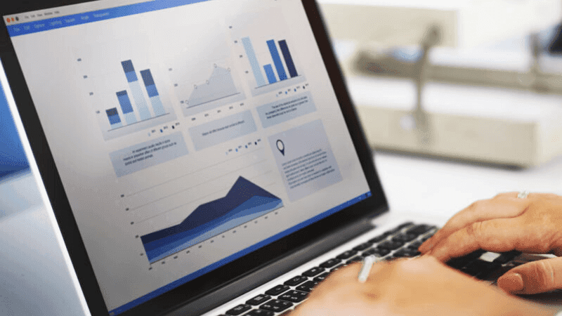 marketing charts on a laptop