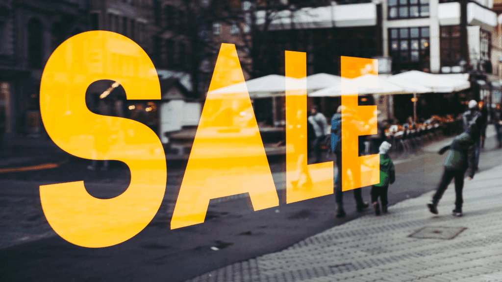 sale sign in store window