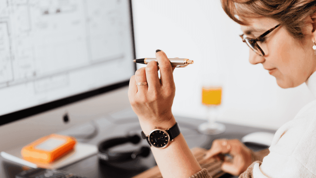 female leader studying cash flow reports