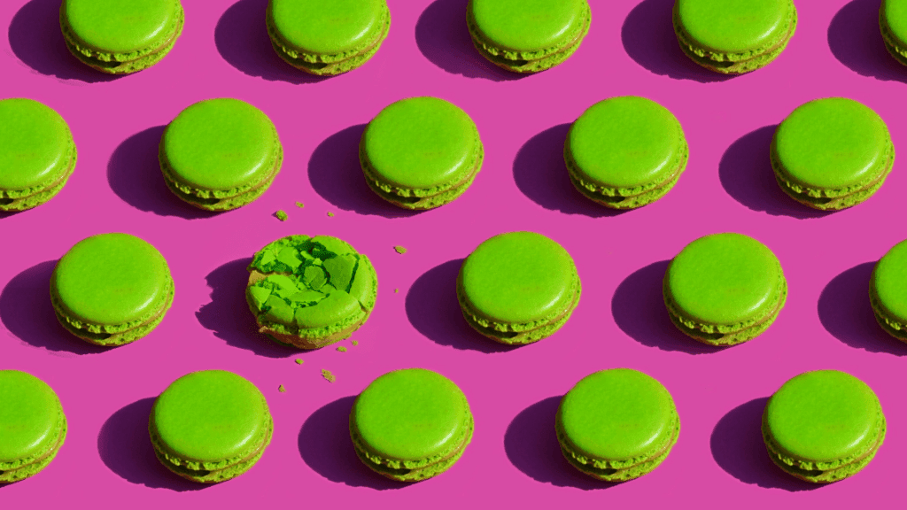 green macarons on purple background